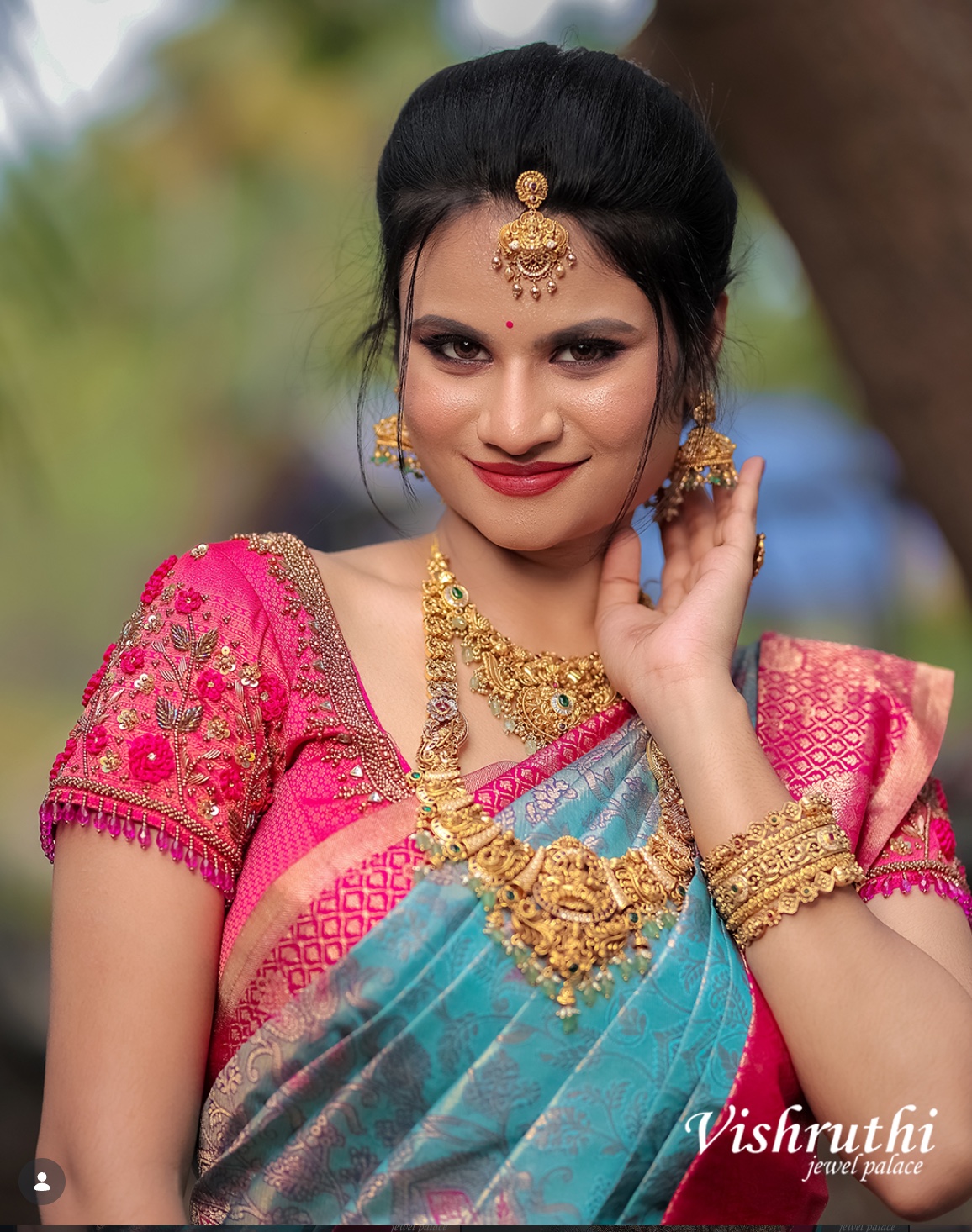 Hot pink floral Aari embroidered bridal blouse sleeve by Harsa Designer Boutique Coimbatore
