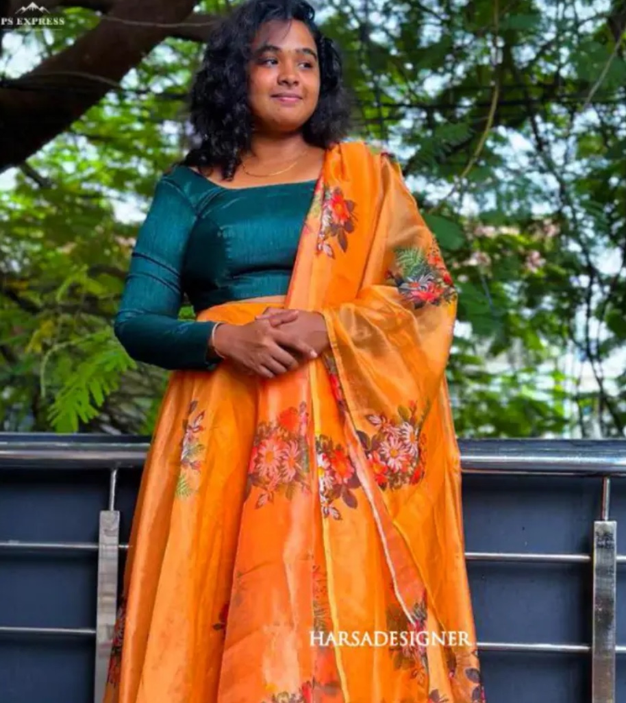 Traditional saree blouse with customized embroidery crafted by Harsa Designer Boutique Coimbatore